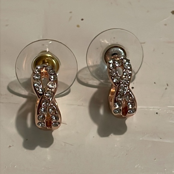1” rose gold tone infinity stud earrings with 18 prong set crystals - Picture 2 of 16